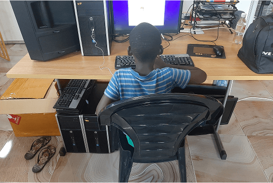 Boy learning on a computer